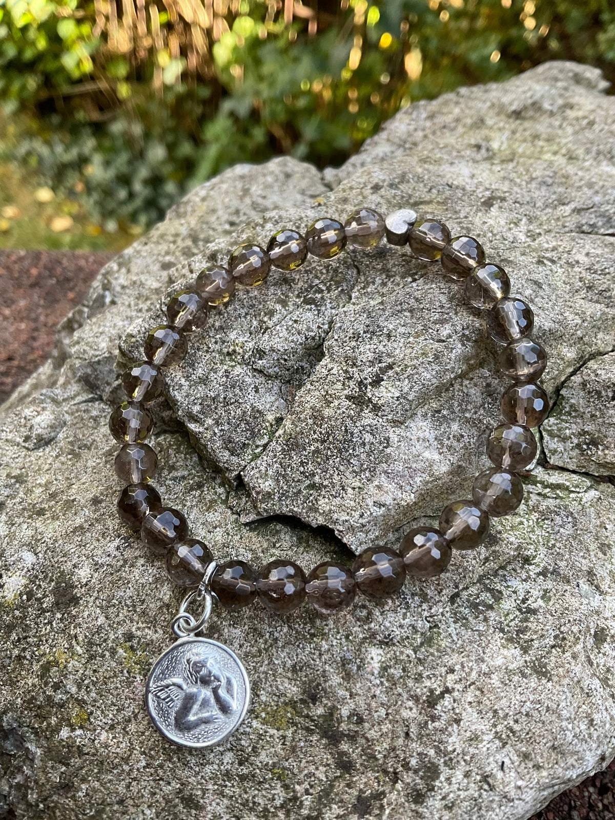 Ein Rauchquarz Armband mit Schutzengel Anhänger 